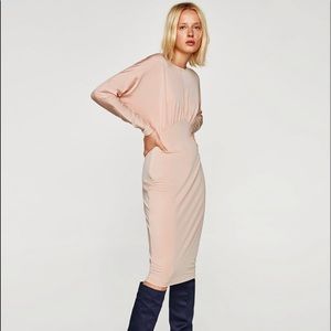 Light pink midi dress.